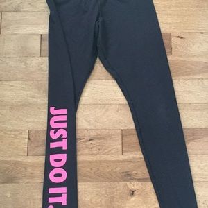 Nike leggings. Black with Pink lettering.